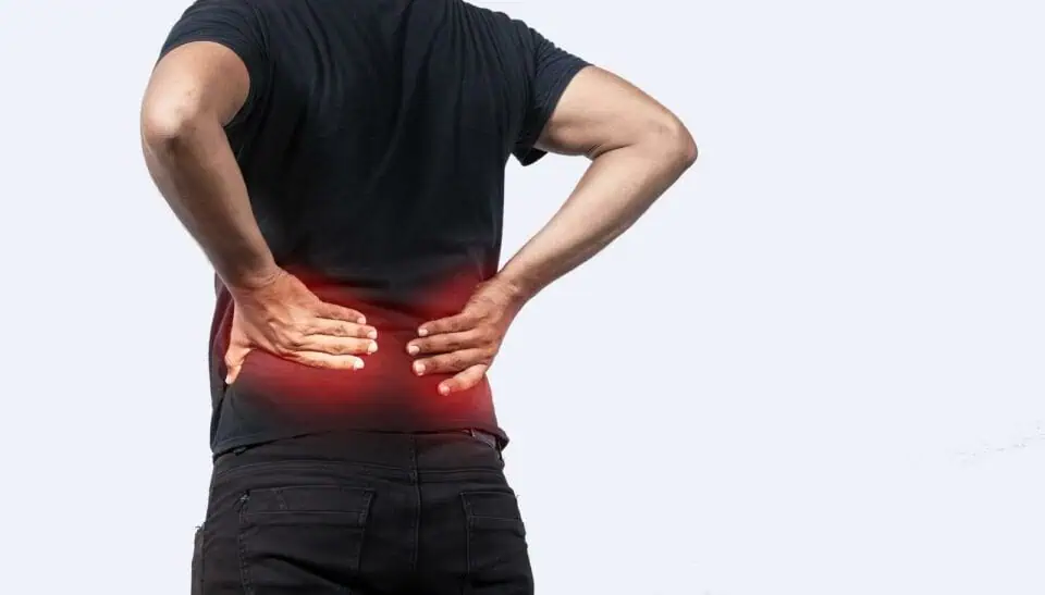 A Sore Man With Back Pain, Man With Spine Problems, Person With Back Problems On Isolated Background, Lumbar Problems Concept